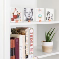 an image of a shelf with pictures and books on it that says artfacturising