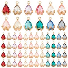 large assortment of colored crystal tears with gold plated bails and clasps