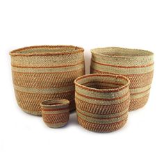 three woven baskets sitting next to each other