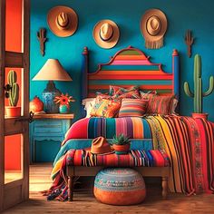 a bedroom with colorful bedding and hats on the headboard, cactus plant in vase