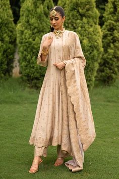 Ecru vegan silk anarkali crafted with all over woven floral pattern, gold zari work highlights and scalloped cut work hem details. Paired with straight pant with woven border and a-l-over floral jaal woven dupatta. - Aza Fashions Straight Anarkali Suits, Beige Anarkali Dress, Beige Anarkali Suits, Anarkali Dress Pattern New 2024, A Line Anarkali, Beige Anarkali, Anarkali Dress Indian, Anarkali Bridal, Anarkali Suits Designer