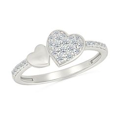 This enchanting promise ring features two side-by-side hearts, one adorned with sparkling lab grown diamonds and the other in a polished finish. Crafted in sterling silver, the elegant design of this ring symbolizes the bond of love and devotion, making it the perfect expression of commitment. The lab grown diamonds are 1/4ctw, F in color, and SI2 in clarity. Sterling Silver Promise Rings, Double Heart, Side By Side, Promise Ring, Promise Rings, Lab Grown, Lab Grown Diamonds, Elegant Design, Beautiful Jewelry