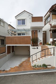 a house with stairs leading up to it