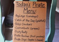 there is a sign that says today's pirate menu on the back of a chair