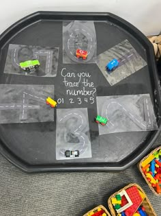 a child's play tray with cars and trucks on it that says can you take the number?