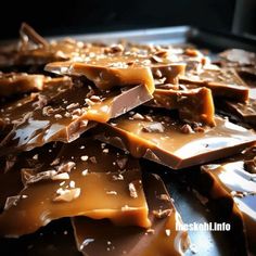 pieces of chocolate with nuts and caramel on top