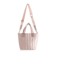 The Shiraleah Logan Mini Tote Cross-Body in rose is the perfect mix of style and functionality. Made with durable nylon and accented with gold hardware, it features double handles and a detachable, adjustable cross-body strap for versatile wear. The top zip closure and inner pockets provide secure storage for your essentials. Chic Pink Nylon Bag, Pink Nylon Shoulder Bag With Detachable Strap, Mini Tote, Gold Hardware, Cross Body, Handles, Handbags, Gold, Quick Saves