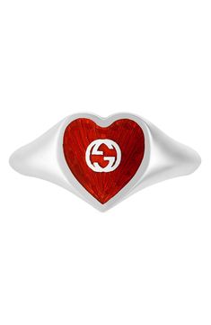 A heart beats red with love on this sterling silver ring iconically marked at the center with the famed interlocking-G moniker. Style Name:Gucci Extra Small Interlocking-G Red Heart Ring. Style Number: 6172573. Luxury Sterling Silver Jewelry With Logo, Gucci Silver Ring With Polished Finish, Gucci Sterling Silver Ring, Gucci Silver Sterling Silver Rings, Modern Sterling Silver Jewelry With Logo, Classic Gucci Sterling Silver Rings, Gucci White Gold Sterling Silver Ring, Gucci Jewelry For Valentine's Day Anniversary, Gucci Rings With Polished Finish For Gift