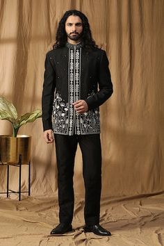 Black bandhgala with pearl and mirror embroidery. Paired with a silk straight pant. - Aza Fashions Formal Nehru Jacket With Mirror Work, Traditional Embellished Bandhgala For Eid, Eid Formal Embellished Bandhgala, Bollywood Style Bandhgala With Mirror Work For Formal Events, Bollywood Style Bandhgala With Mirror Work For Formal Occasions, Embellished Bandhgala For Eid, Traditional Embellished Bandhgala For Festive Season, Formal Embellished Bandhgala For Eid, Bollywood Style Embellished Bandhgala For Festive Season