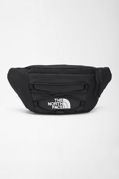 This The North Face Jester Lumbar Bag in Black has bungee system perfect for stretching to hold bulkier items, adjustable shoulder strap, and is comfortable to wear. Great for class or traveling, you’ll love this! Features: The North Face Style: NF0A52TM-4H0 Color: TNF Black The North Face crossbody Adjustable strap Bungee system can stretch and hold bulkier items Adjustable webbing strap allows for both a waist and crossbody carry Large central compartment holds your smaller valuables External, secure zip pocket for organization The North Face logo on front Dimensions: 11'' x 5.75'' x 4'' Functional The North Face Bags For Outdoor Activities, Practical The North Face Bags For Outdoor Activities, Practical The North Face Hiking Bag, The North Face Crossbody Bag With Adjustable Strap, The North Face Practical Bags For Everyday Use, Functional Black Hiking Bags, Practical The North Face Bags For Everyday Use, Functional The North Face Crossbody Bag, Practical Black The North Face Bag