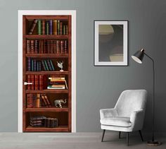 an empty chair in front of a bookshelf