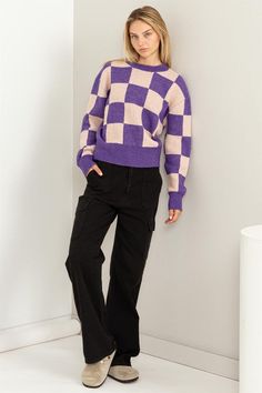 This sweater is designed to turn heads and keep you warm during those relaxed weekends. The checkered pattern adorns the entire sweater, making a bold statement that's hard to ignore. The crew neck adds a touch of timeless elegance, while the drop shoulders contribute to a laid-back and effortless vibe. Model is 5’9” wearing a small. Bust: 32", Waist: 23", Hips: 35" Fabric Contents: 64% Acrylic 25% Polyester 85 nylon 3% Spandex, Stretch fabric, Non-sheer fabric Care Instructions: Machine wash co Curvy Swimwear, Effortless Fashion, Sweater Fits, Weekend Outfit, Sweater Making, Checkered Pattern, Sheer Fabrics, New Trends, Casual Wardrobe