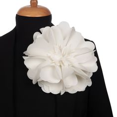 Discover Elegance in Every Detail with Our Ivory Floral Brooch Crafted with meticulous attention to detail, our Ivory Floral Brooch is a stunning embodiment of elegance and sophistication. Fashioned from premium cotton fabric, it showcases a captivating bouquet of delicate wildflowers in elegant ivory tones, boasting an impressive diameter of 20 cm (7.8 inches). In the middle of this floral arrangement, little flower seeds are used as embellishments, adding a touch of natural beauty and uniquene Luxury Handmade White Brooches, Elegant White Wedding Brooches, Elegant Cream Brooches For Formal Occasions, White Flower Brooch For Party, White Flower Brooches For Parties, Elegant White Lapel Pin Brooch, Elegant White Brooches With Handmade Flowers, Elegant White Lapel Pin For Wedding, Elegant White Flower Lapel Pin