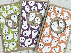 three halloween cards with ghost faces on them