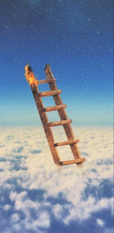 a ladder in the sky with a fire coming out of it's end and clouds below