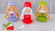 three knitted dolls sitting next to each other