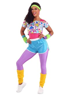 a woman in colorful clothing posing for the camera