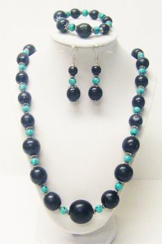 Round Black Wood w/Aqua Glass Bead Strand Necklace/Bracelet/Earrings Set Aqua Glass, Pearl Necklace Earrings, Silver Fish, Jewelry Diy Bracelets, Bracelet Earring Set, Jewellery Sets, Idea Board, Beaded Statement Necklace, Homemade Jewelry