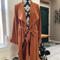 Bnwt Express Jacket/Coat With Belt. Sorry It’s Wrinkled, Just Didn’t Have Time To Iron It. It Is A Brown/Clay Color And Is Very Flowy When On. Size Small Brown Clay, Coat With Belt, Clay Color, Coats Women, Jacket Coat, Coats For Women, Coats Jackets, Jackets & Coats, Jackets For Women