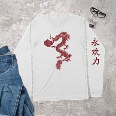 Japanese Aesthetic Dragon Long Sleeve Shirt. Firstly, this design features a unique fire breathing dragon design on the front. Secondly, this design features 3 Kanji symbols on the left sleeve symbolizing ETERNAL HAPPINESS and STRENGTH. Next, add this Japanese Dragon Aesthetic styled design to your Japan Street Wear attire. Also, our Japanese Aesthetic Dragon Shirt makes a great addition for that Dragon Aesthetic Clothing Fan. In addition, this Aesthetic Dragon design will inspire that inner dra Japanese Dragon Aesthetic, Japan Street Wear, Aesthetic Dragon, Dragon Aesthetic, Kanji Symbols, Japan Streetwear, Dragon Shirt, Art Top, Fire Breathing Dragon