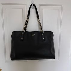 Kate Spade Black Shoulder Bag Brand New, In Great Condition Very Spacious Bag, Perfect For Work, Can Fit Laptop Along With Other Items Zippers On Side To Further Expand Bag Zippered Large Pocket On One Side Of Purse, With Double Pocket On Other Side Magnetic Button To Close Center Of Purse 15”L, 10”H, 4.5”W (Body Of Bag) 10” Strap Dropdown When Wearing On Shoulder Please Comment For More Specific Measurements Or Other Questions! Black Travel Satchel With Chain Strap, Black Satchel With Chain Strap For Travel, Black Satchel With Chain Strap For Office, Kate Spade Bags With Metal Hardware For Everyday Use, Kate Spade Shoulder Bag With Branded Hardware For Travel, Kate Spade Satchel Shoulder Bag With Branded Hardware, Kate Spade Everyday Bags With Chain Strap, Kate Spade Satchel With Branded Hardware, Kate Spade Travel Bags With Branded Hardware