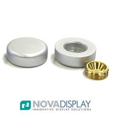 an image of two metal knobs and a gold nut on a white background with the words novadisplay above it