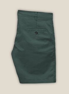 Bemuse yourself with classic charm and modern grace in our Gallo Green Cotton Stretch Chino Shorts. Meticulously crafted from the finest premium cotton. The sumptuous green hue imparts an air of exquisite nobility that is both timeless and contemporary.   This classic design makes it a versatile addition to any wardrobe making it perfect for a range of occasions, from high-profile formal gatherings to chic, upscale casual events.  Look features a front cross pocket, and two welted back pockets with a button.   Click 'Customize Now' to modify the look if needed. Elegant Green Bottoms With Pockets, Elegant Green Bottoms With Welt Pockets, Elegant Cotton Shorts With Pockets, Elegant Green Summer Bottoms, Green Relaxed Fit Bermuda Shorts For Spring, Olive Cotton Bottoms For Summer, Classic Fitted Cotton Bottoms, Olive Cotton Summer Bottoms, Short Green Cotton Bottoms