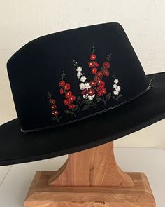 These hats feature large scale florals of your choosing. Examples shown are hollyhocks and two vintage inspired arrangements. Each of the hats in the Flora Series have been embroidered on the customer's hat of choice and with their input on colors for the embroidery. Submit a commission request form to discuss yours! Custom designs like these are in my level 3 price point at $400. Embroidered Fedora, Bohemian Hats With Floral Embroidery And Curved Brim, Black Embroidered Curved Brim Hat, Hand Painted Black Hat With Curved Brim, Floral Embroidered Brimmed Hat, One Size, Embroidered Hats Ideas, Black Hand-painted Hat With Curved Brim, Custom Jean Jacket, Custom Shoes Diy