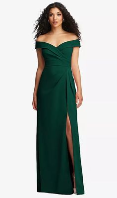 a woman in a long green dress with a slit down the side and one leg