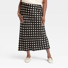 Dress up for brunches, lunches or dinners in chic style with this Maxi Slip Skirt from A New Day™. This maxi-length slip skirt is made from lightweight satin fabric for all-day comfort, while the full elastic waistband lends a secure fit. Tailored in a high-rise silhouette with a slim fit for a flattering look, you can pair this skirt with your fave tops and footwear for versatile ensembles. A New Day™: Style that goes wherever you do. Midi Sweater Skirt, Faux Leather Mini Skirt, Slip Skirt, Polyester Dress, Women Maxi, Leather Mini Skirts, A New Day, Cozy Knits, Bottom Clothes