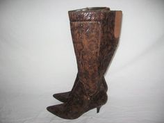 Vintage Nine West NWPickWick Textile Upper Balance Man Made Brown Black Snake Animal Print Stiletto High Heel Side Zipper Calf High Boots   Size:  8 M  Height:  17 1/4"  Outside length toe to heel against wall:  10 3/" Width:  3 3/8" Heel Height:  3"  See pictures for condition  Please contact ANVINTRO with any questions regarding this item Nine West Boots, Calf High Boots, How To Make Brown, Black Snake, High Heels Stilettos, 8 M, Boot Shoes Women, Nine West, High Boots