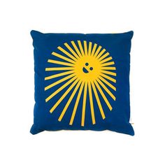 a blue and yellow pillow with the sun on it