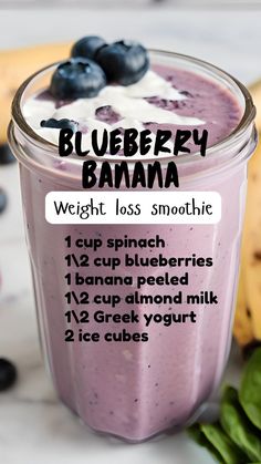 blueberry banana smoothie in a mason jar with instructions on the side, surrounded by bananas