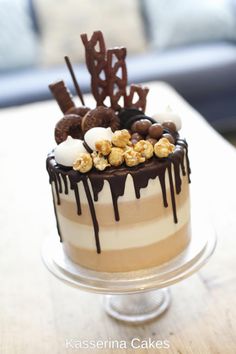 a cake with chocolate and marshmallows on top