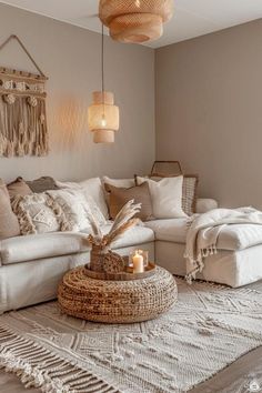 a living room filled with furniture and pillows