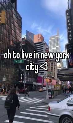 a woman walking across a street in new york city, with the words oh to live in new york city 3