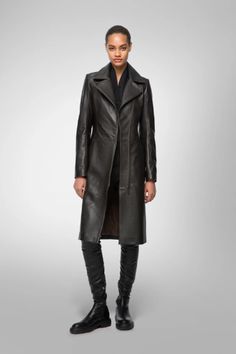 Women's Leather Coat In Black Sleek Brown Leather Outerwear, Luxury Long Leather Workwear Jacket, Luxury Leather Outerwear For Office, Luxury Leather Office Outerwear, Elegant Winter Leather Jacket With Leather Lining, Black Leather Jacket For Office And Winter, Luxury Black Outerwear With Leather Lining, Sleek Long Leather Coat, Black Leather Outerwear With Leather Lining