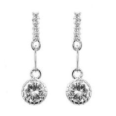 Round delicate stones dangle at the end of this pair their solitaire appearance lending to its classic feel. Our genuine rhodium finish is achieved using an electroplating process that coats the item with heavy layers of rhodium a close cousin to platinum which gives our jewelry a platinum luster. Setting Type: Bezel Stone Size: 5.7 (mm) X 5.7 (mm) 1.6 (mm) X 1.6 (mm) Stone Cut: Round Drop Earrings Simple, Cubic Zirconia Jewelry, Cz Earrings, Simple Jewelry, Simple Earrings, Round Earrings, Wholesale Jewelry, Luxury Jewelry, The Ordinary