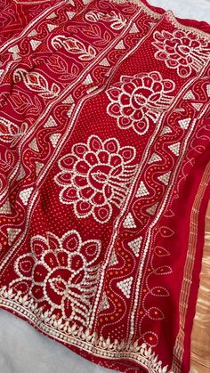 FABRIC OF SAREE Pure Gajji silk bandhani  Fabric of blouse pure gajji silk COLOUR - Red        WORK Gotapatti         .  Note - Prebooking 15 days approximately Red Bandhani Print Unstitched Saree, Red Bandhani Bollywood Blouse Piece, Red Bandhani Print Saree For Diwali, Red Banarasi Silk Blouse Piece With Bandhani Print, Bandhani Print Georgette Traditional Wear For Navratri, Red Bandhani Print Blouse Piece For Navratri, Traditional Red Bandhani Blouse Piece, Navratri Georgette Traditional Wear With Bandhani Print, Red Blouse Piece With Bandhani Print For Navratri