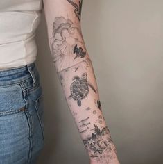 a woman with a tattoo on her arm