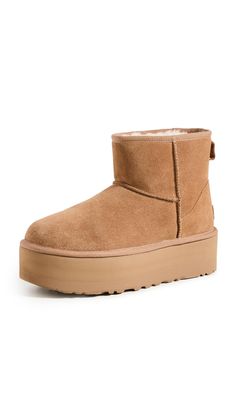 PRICES MAY VARY. Suede upper Overlock stitch detailing on seams 17mm UGGplush upcycled wool lining and sockliner Treadlite by UGG outsole 2" platform height Ugg Classic Mini Platform, Ugg Store, Ugg Womens, Overlock Stitch, Ugg Classic Mini, Ugg Classic, Classic Boots, Dream Shoes, Classic Mini