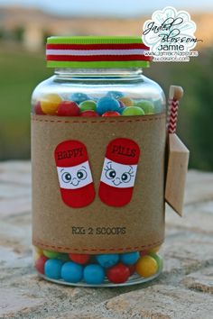 a jar filled with lots of colorful candies