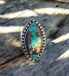 WANTED all over the Universe. Turquoise is recognized Sought After by early KINGS, MOVERS, and SHAKERS! Turquoise is said to be a vessel Imbued with energies associated with Heaven! All My Turquoise is Carefully chosen from around the World. I love the Raw Authentic look and feel of the stone...so I do not over polish the Turquoise! True Bohemian Style...an Original work of Art that you can treasure for a lifetime! Each of My Creations are One of A Kind and are Hand wrought to bring out the best Western Style Turquoise Sterling Silver Ring, Handmade Western Style Silver Turquoise Ring, Handmade Western Turquoise Ring In Sterling Silver, Handmade Silver Turquoise Ring In Western Style, Handmade Southwestern Silver Turquoise Ring, Bohemian Sterling Silver Turquoise Ring Nickel Free, Collectible Bohemian Turquoise Ring, Western Sterling Silver Turquoise Ring, Western Style Turquoise Inlay Ring In Sterling Silver