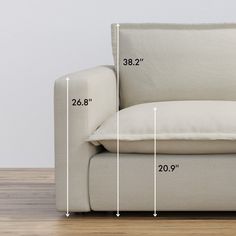 a couch with measurements for the seat and back