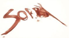 the word zoo written in brown ink on a white paper with a bird's tail sticking out of it