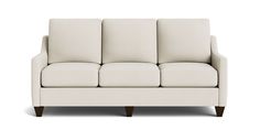 a white couch sitting on top of a wooden frame