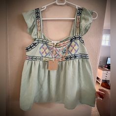 Brand New With Tags, Never Worn. Bought At A Boutique Shop In Laguna Beach. Light Green Gingham Top With Pattern. Ruffle Sleeves. Waist Length. Very Flattering And Cute Cute Green Tops For Vacation, Cute Green Summer Blouse, Cute Green Top For Beach, Cute Green Tops For The Beach, Pilates Shirt, Light Pink Blouses, Gingham Top, Green Gingham, High Low Blouse