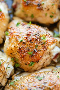 closeup of chicken thighs with parsley on top