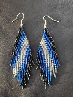 Black, blue and silver fringe earrings. Available with silver plated or steel fish hooks Blue Fringe Beaded Drop Earrings, Blue Fringed Beaded Drop Earrings, Blue Fringe Drop Earrings, Blue Fringe Tassel Drop Earrings, Blue Beaded Fringe Dangle Earrings, Blue Dangle Tassel Earrings With Fringe, Blue Dangle Earrings With Beaded Fringe, Weekend Crafts, Fringe Earrings