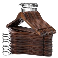 wooden clothes hangers stacked on top of each other